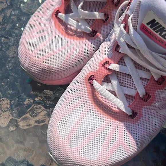 Nike Women's Pink, White and Black athletic sneakers. - Picture 6 of 17